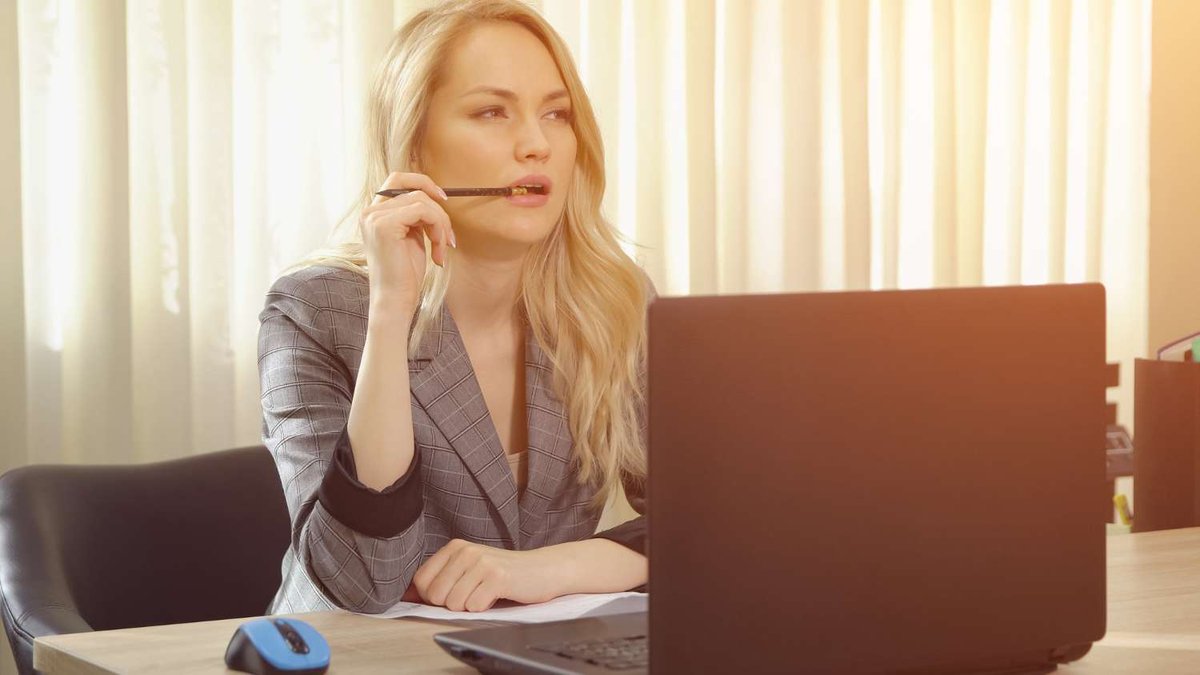 A girl takes a test at a driving school in Georgia.