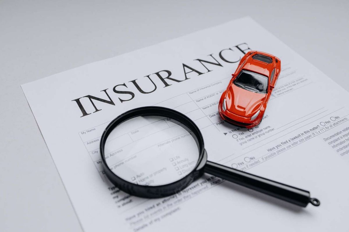 An advertising poster about travel insurance for tourists on the streets of Tbilisi