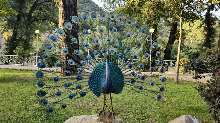 Decorative figurine of a peacock