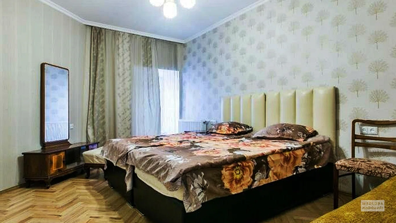 Спальня в номере апарт-отеля GTNL