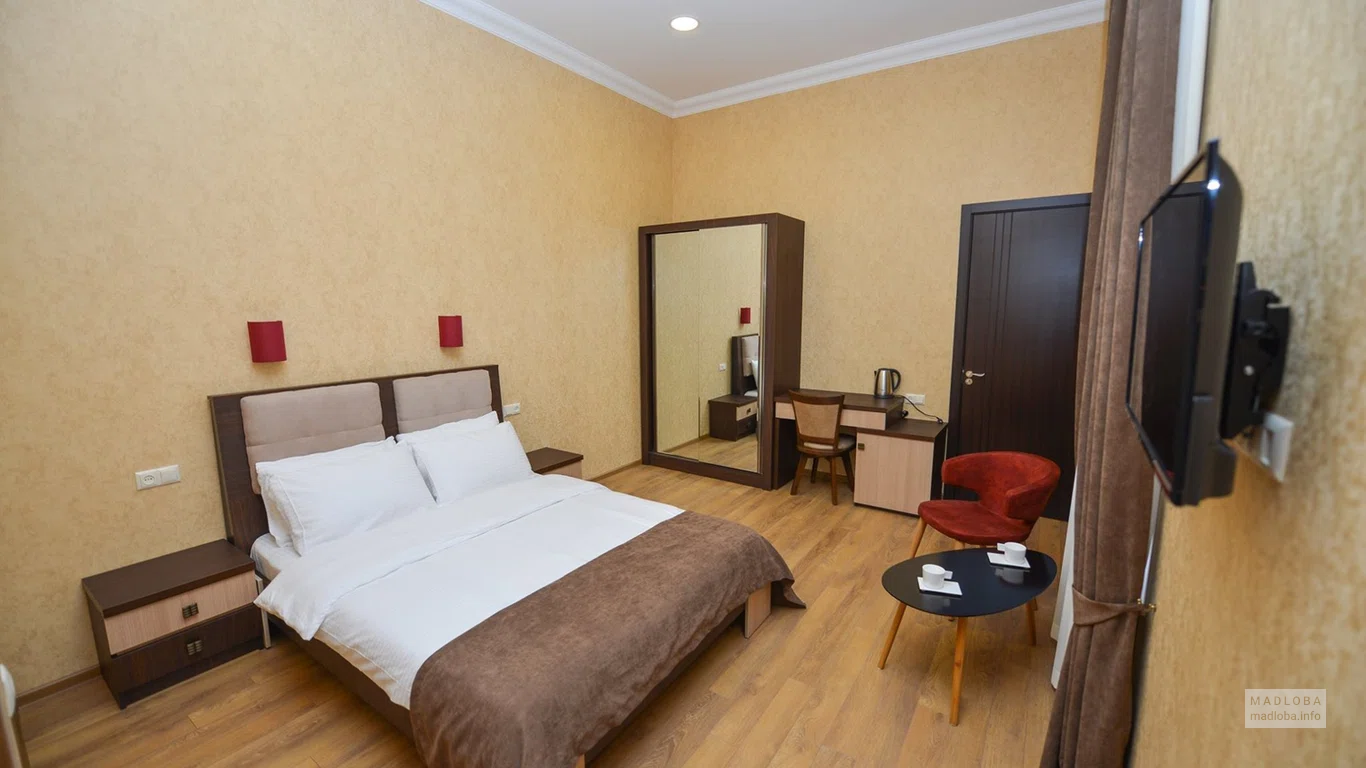 Спальня в номере отеля Giardino di Rose
