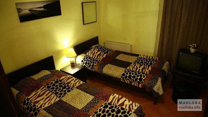 Кровати в номере Laba Guest House
