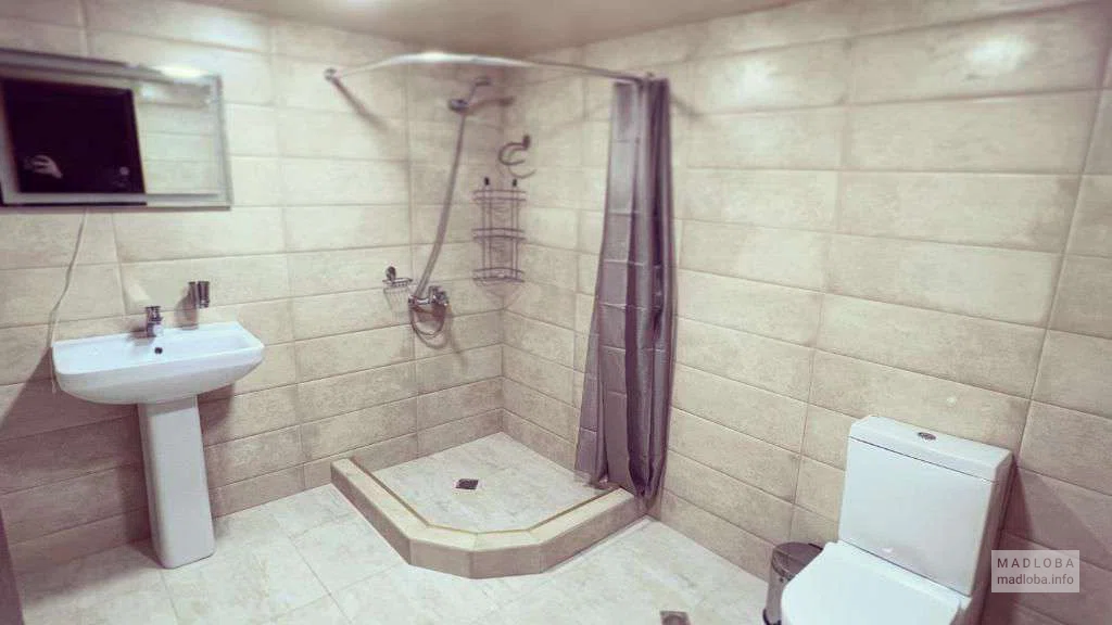 Ванная комната в гостевом доме Gardenia