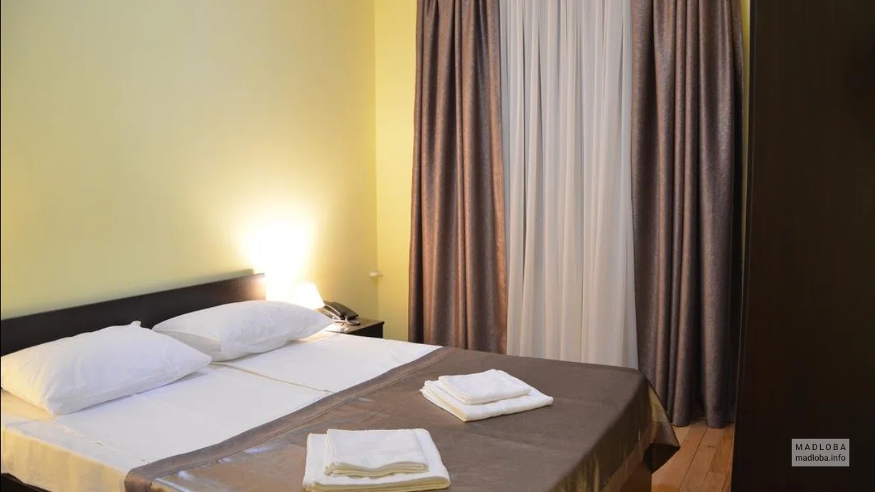 Кровать в отеле Dalida Грузия