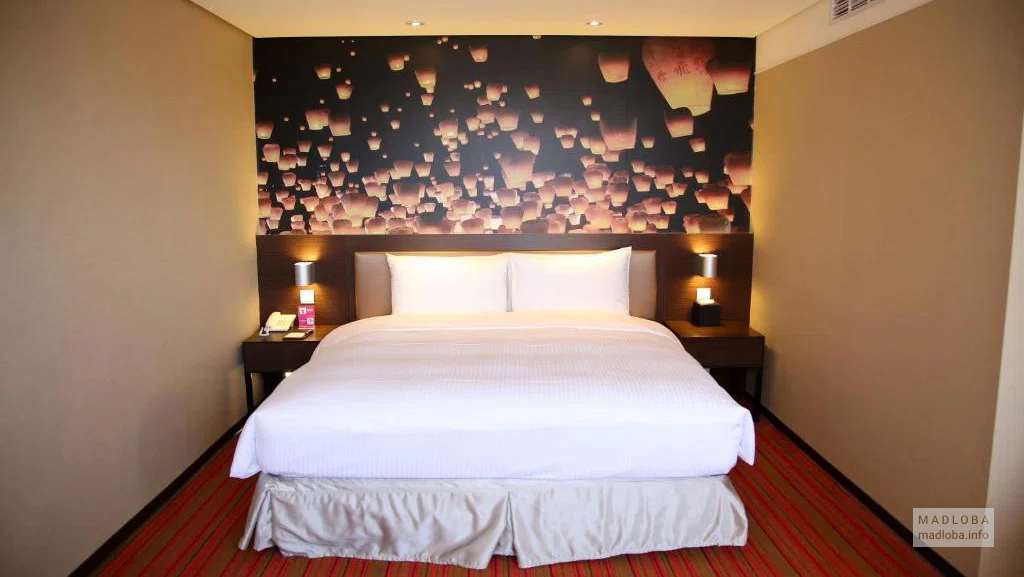 Спальня в отеле Тао