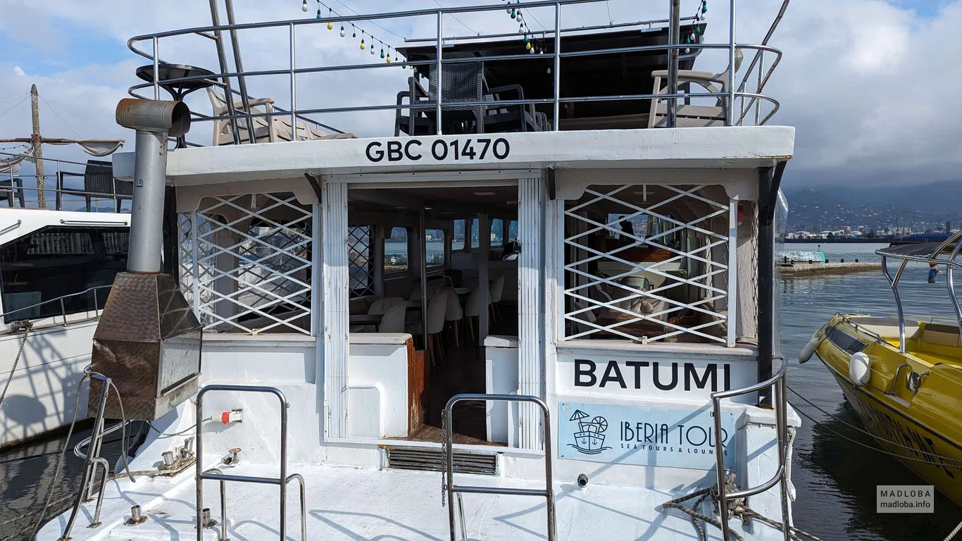 Double-deck boat Iberia Large in the yacht port of Batumi