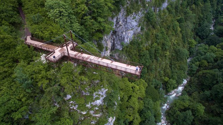 Go to the suspension bridge over the deepest canyon of Georgia!
