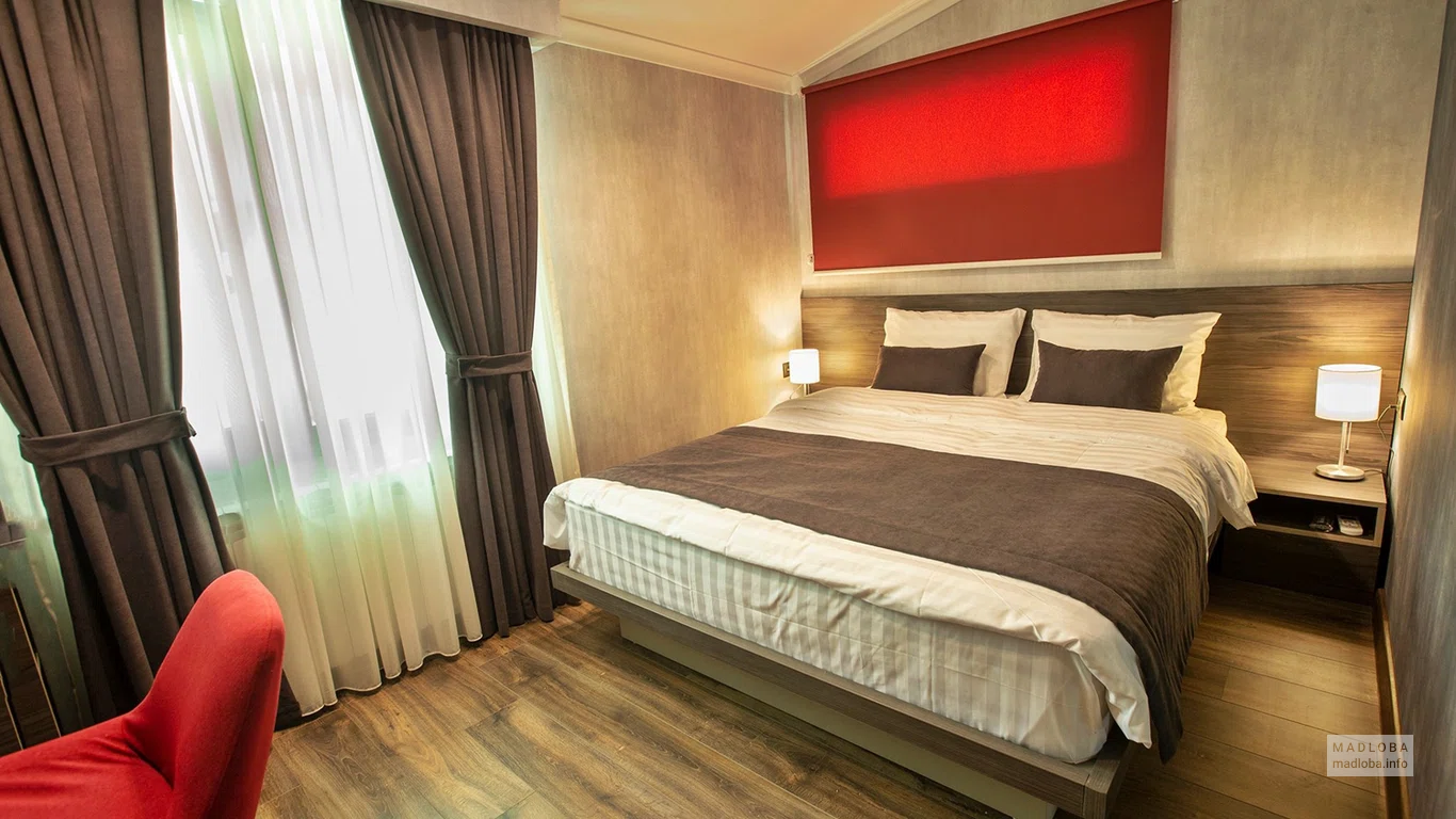 Спальня в номере отеля Kope Palace