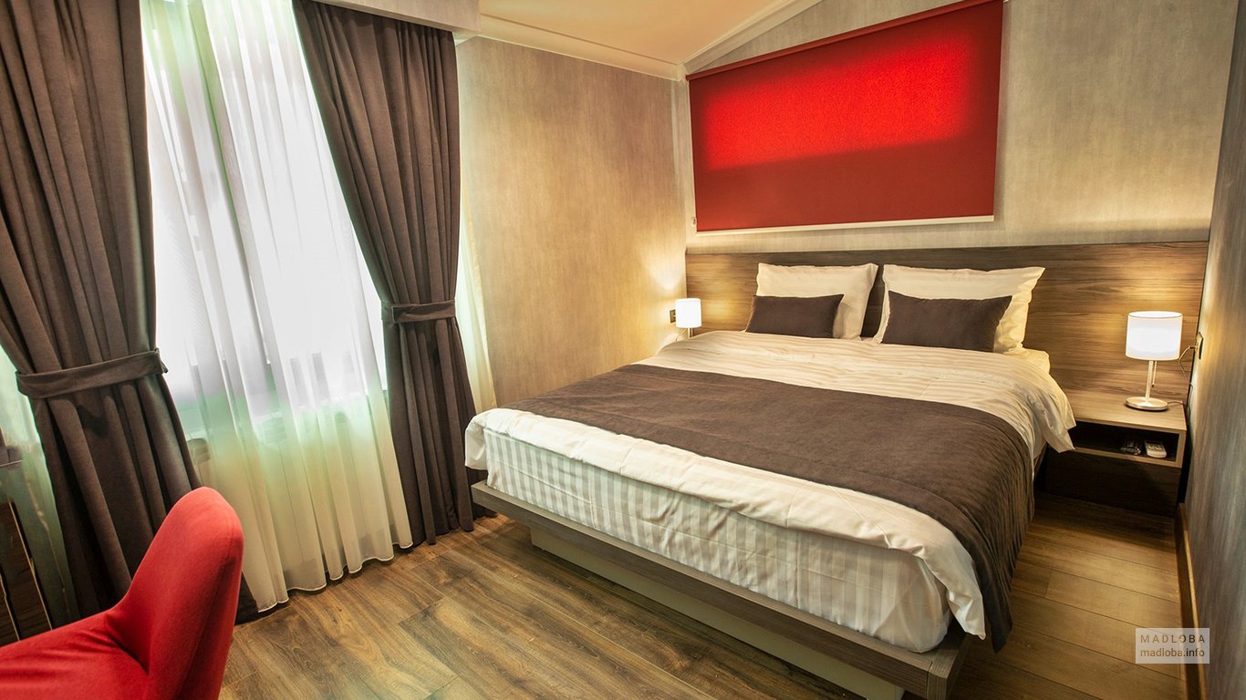 Спальня в номере отеля Kope Palace