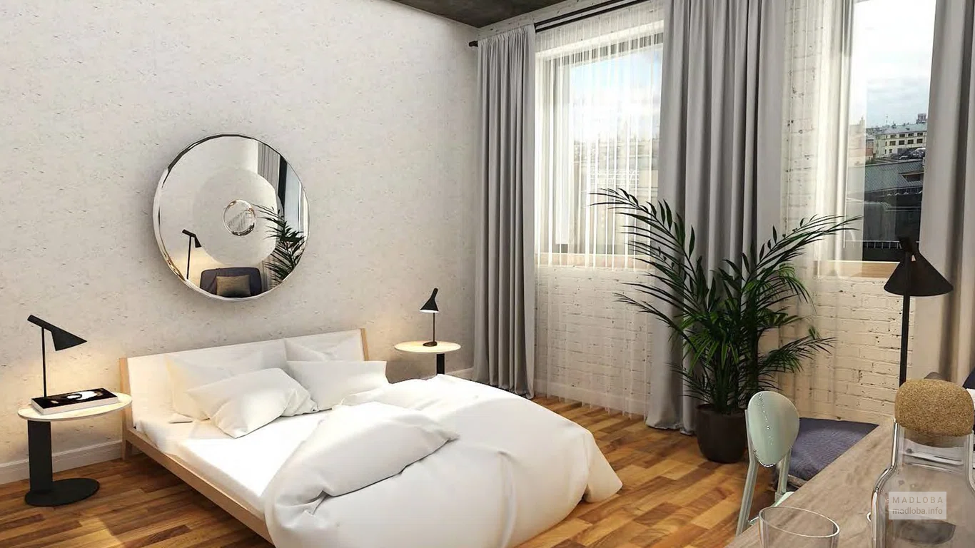 Спальня в номере апарт-отеля Мариинский