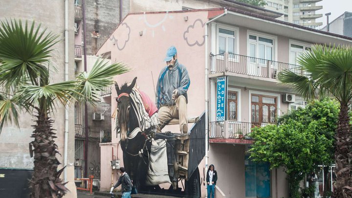 NIKO Street Art: Matthias Mross - Man With The Mule Mural