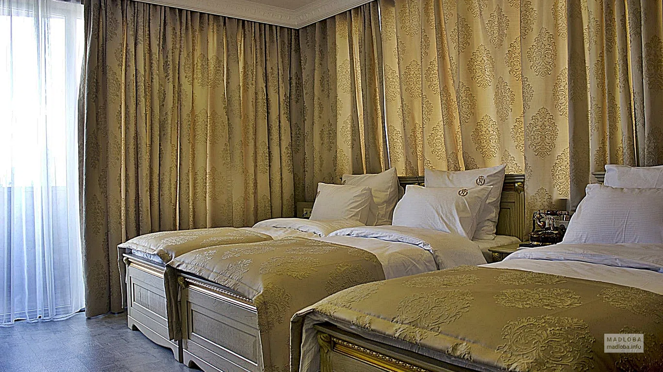Спальня в номере гостиницы Неаполь