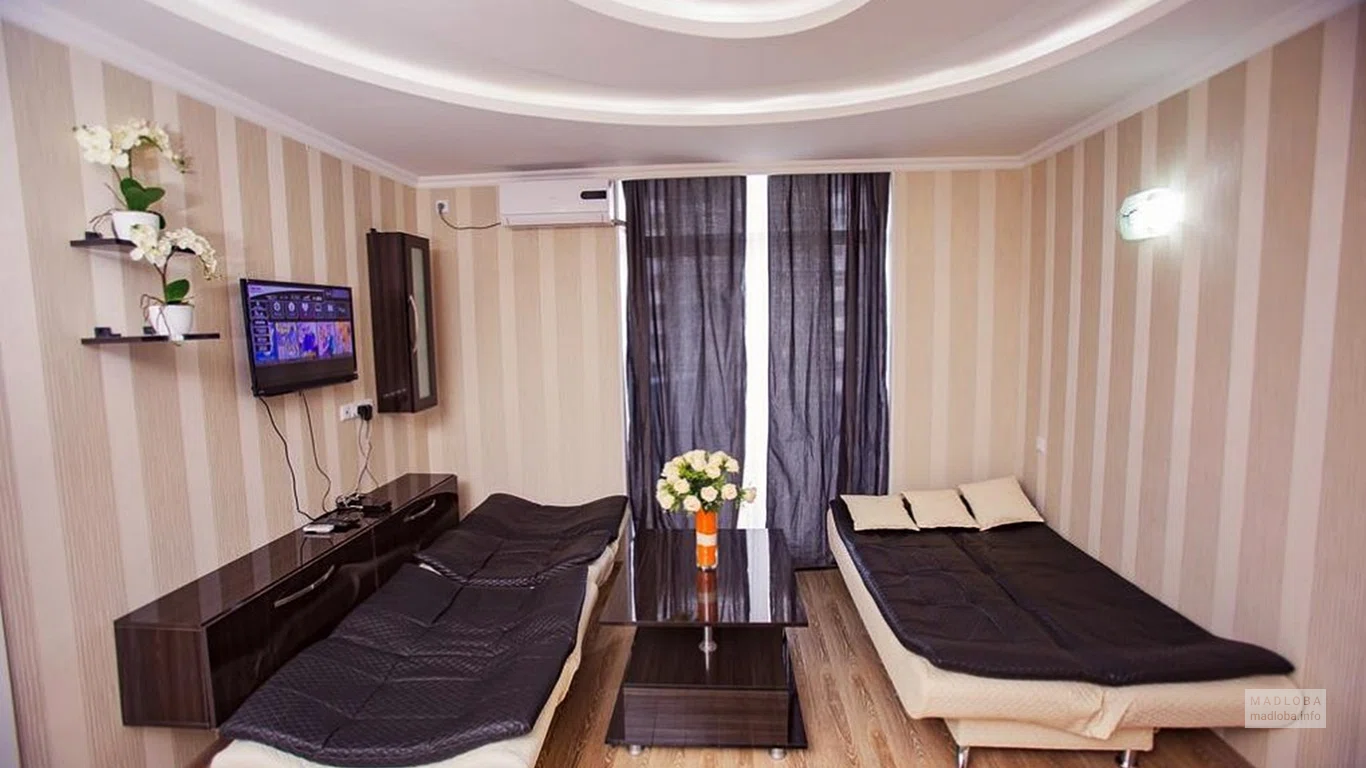 Спальня в номере гостиницы Orient Lux