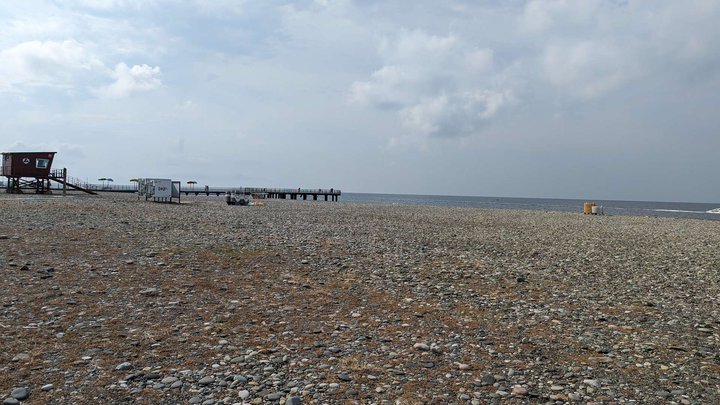 The beach to the right of the pier