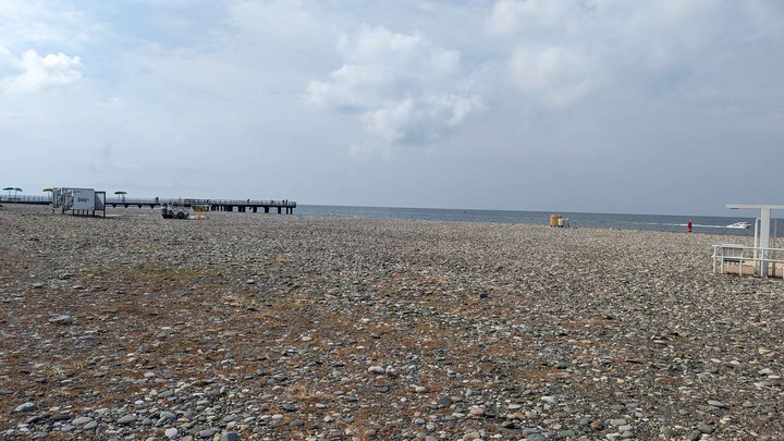 The beach to the right of the pier
