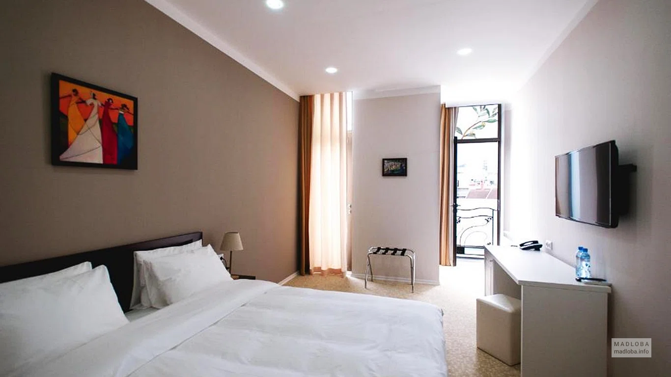 Спальня в номере отеля Пьяцца Четыре Цвета