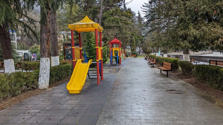 Children's playground and park on the banks of the Kura River