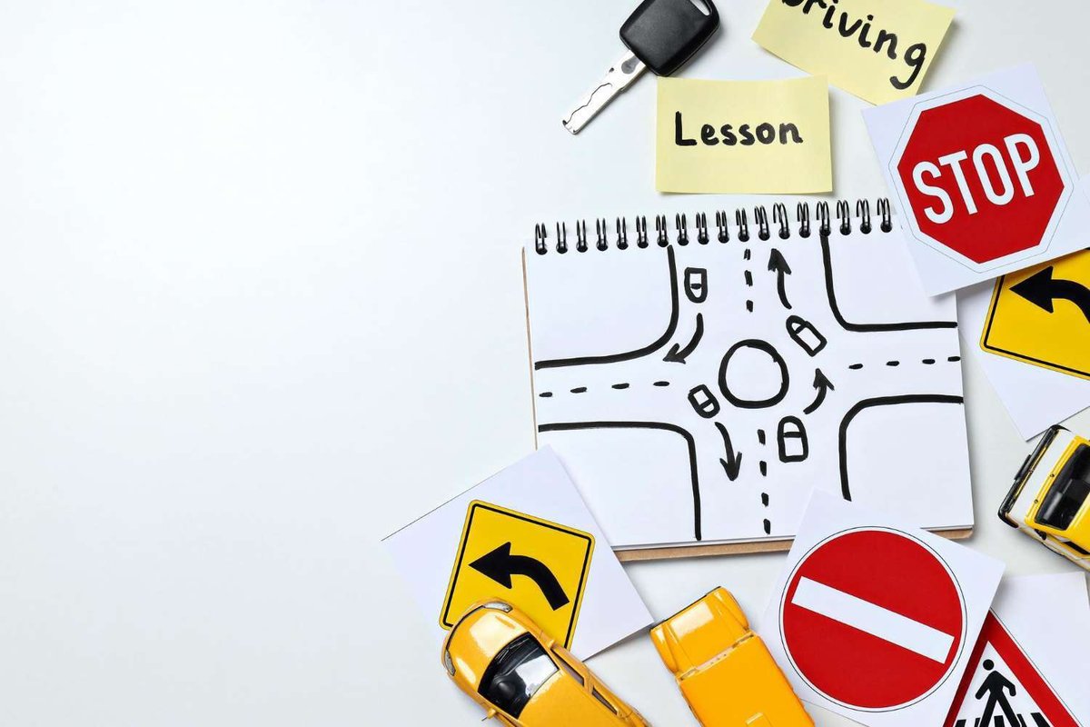 Road signs and vehicles on a white background