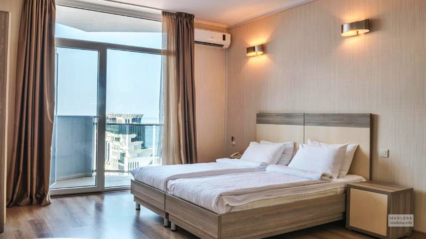 Спальня в отеле Silk Road Sea Towers
