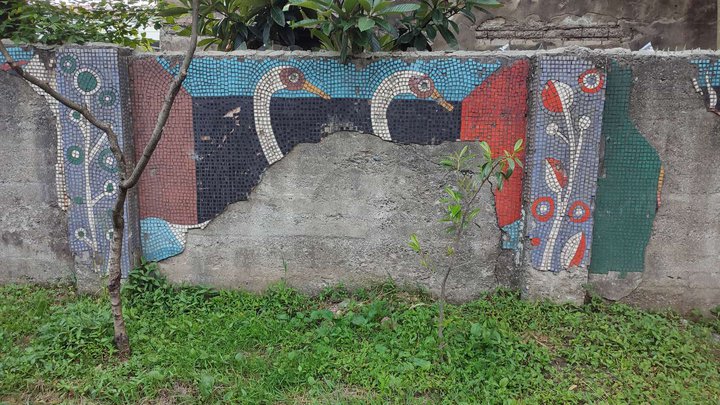 Soviet mosaic fence and facade decoration