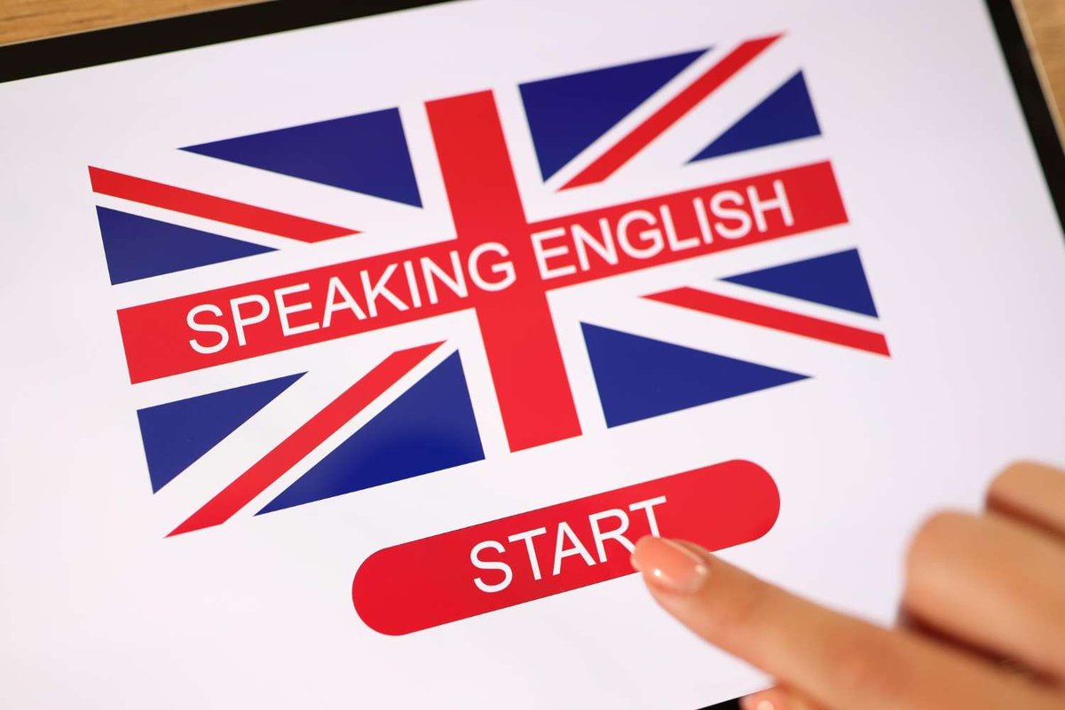 A finger taps a “Start” button beneath a Union Jack graphic labeled “Speaking English” on a tablet screen.