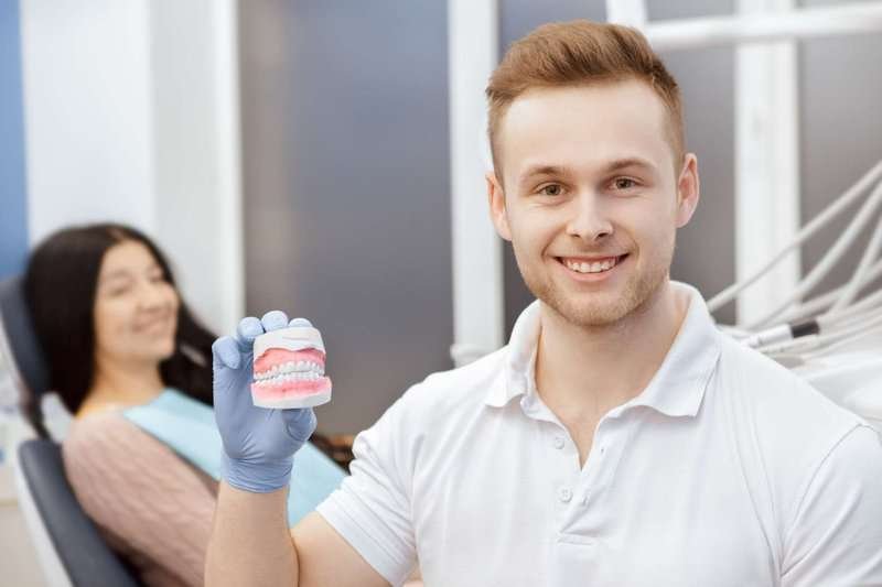 dentist with dentures