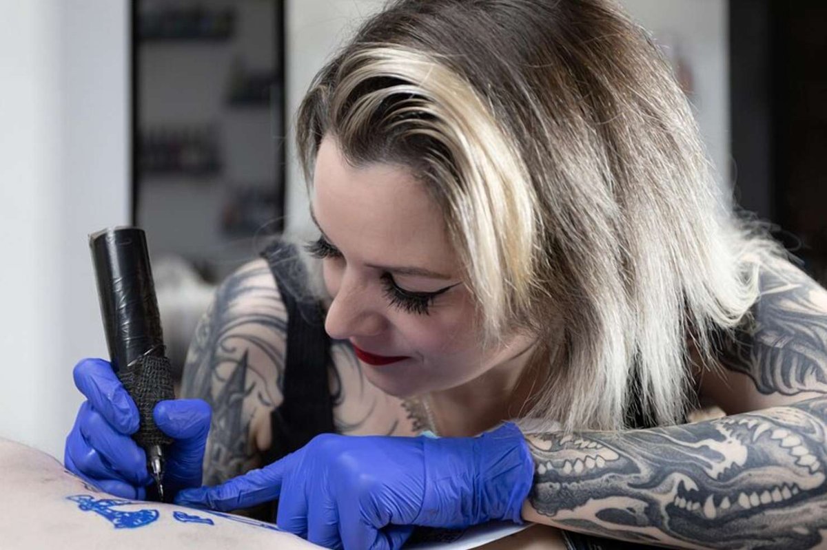 Tattoo artist at work