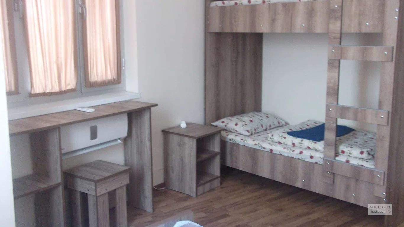 Общая комната для сна в хостеле Team Apartment In Kutaisi