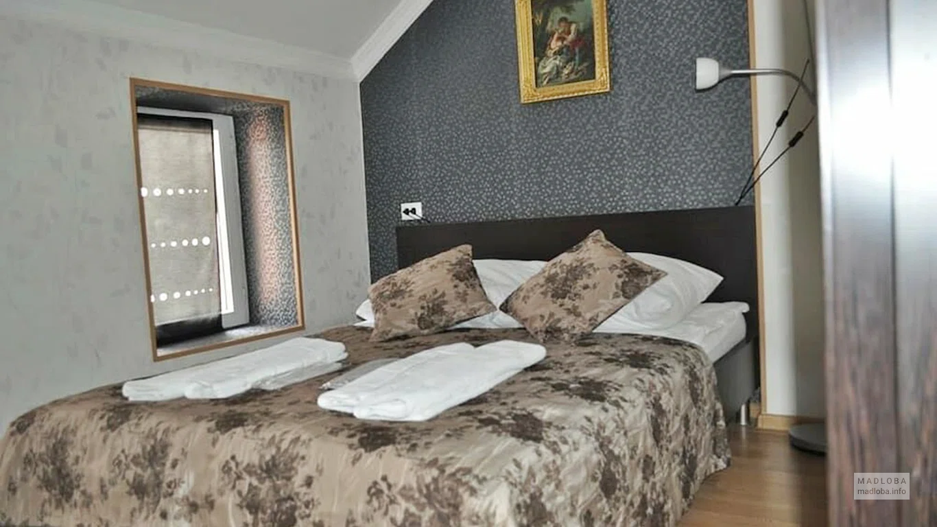 Кровать в Your Comfort Hotel