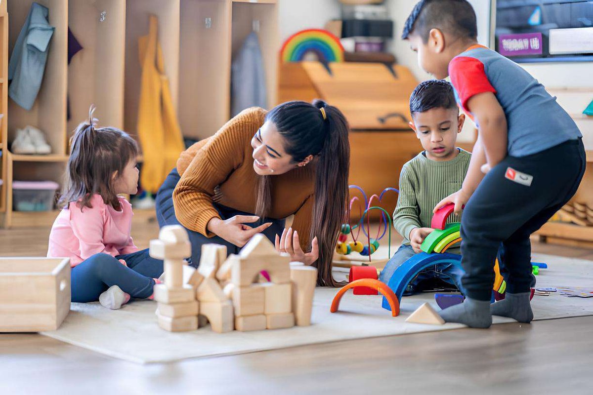a girl visits children in an orphanage
