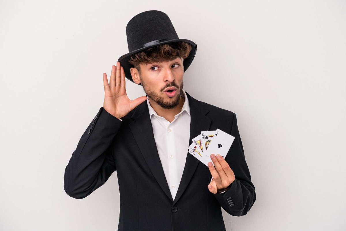 a man with cards in his hands