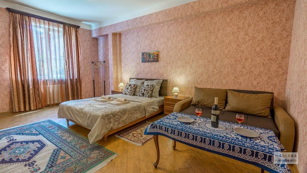 Кровать в гостевом доме “Alpha Tbilisi”