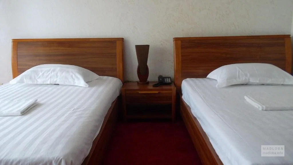 Кровати в отеле