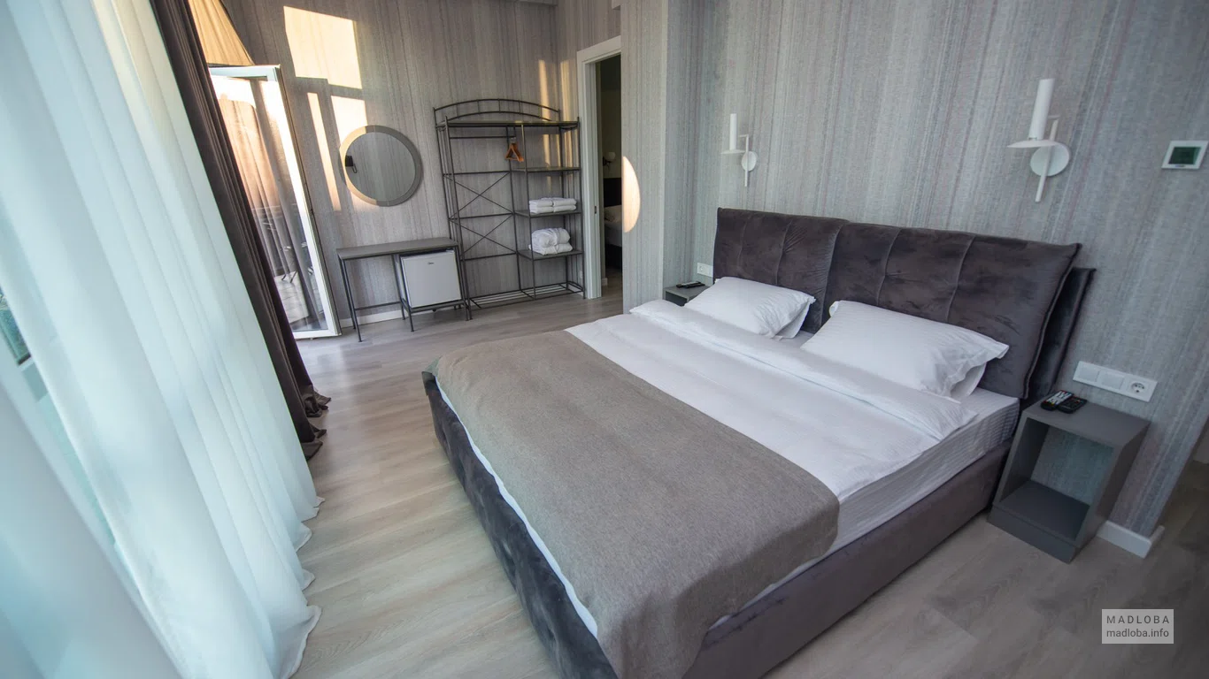 Кровать в номере отеля Bina 21 Hotel в Грузии
