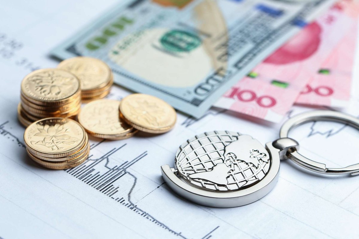 coins-paper-money-and-globe-on-white-statistic-.original