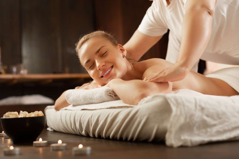 A girl at a massage session from a professional massage therapist
