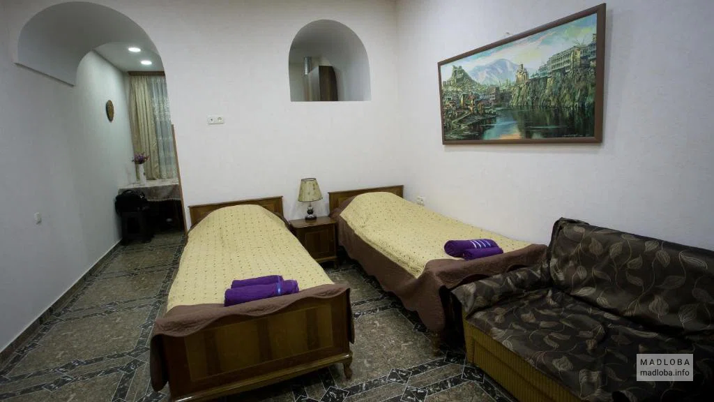 Кровати в Апартаментах G&M в Тбилиси