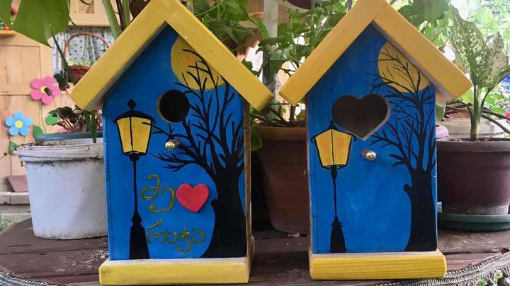 Birdhouses and handmade garden decorations