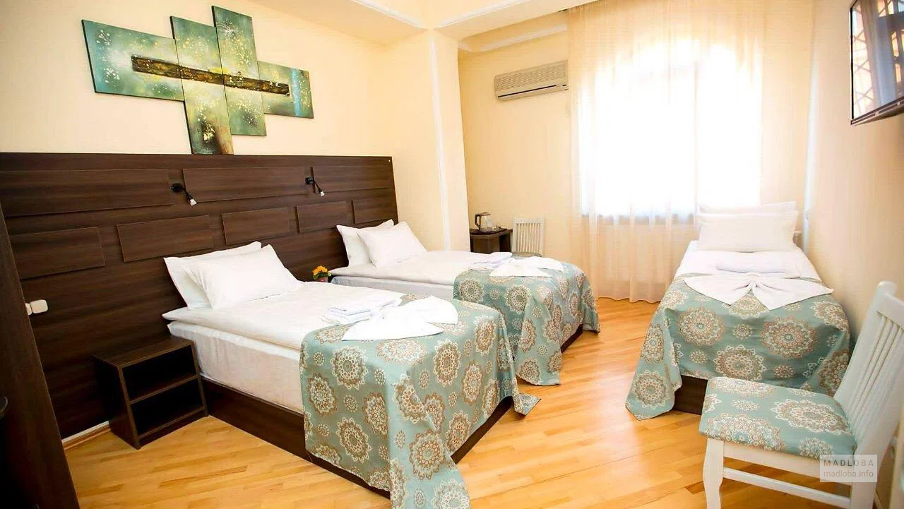 Спальня в номере отеля Бадаги