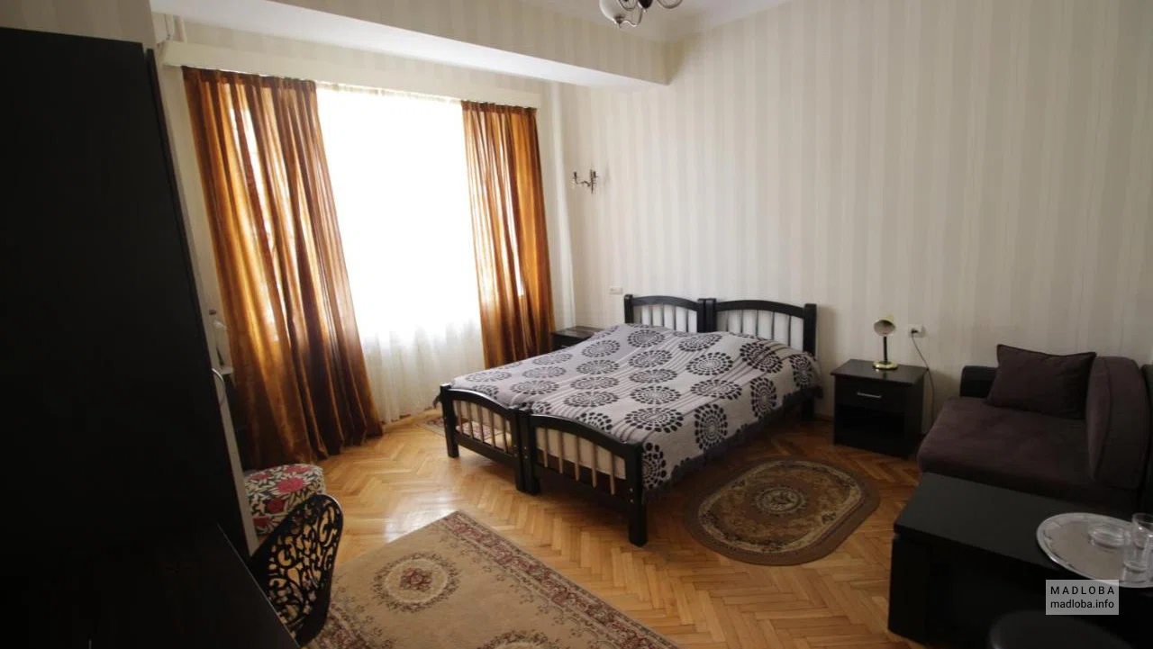 Кровать в номере Hotel Bu в Грузии