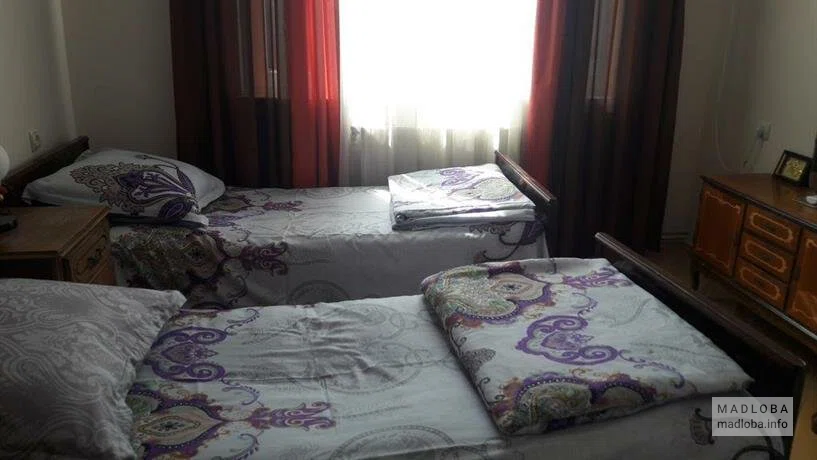 Односпальные кровати в номере Hotel MMG