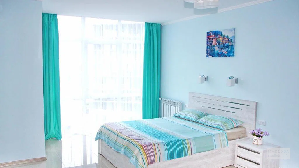 Спальня в отеле Menthol Residences at Sea Resort