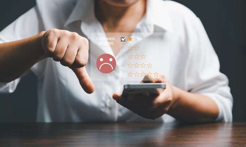 dissatisfied customer - sad smiley and thumbs down