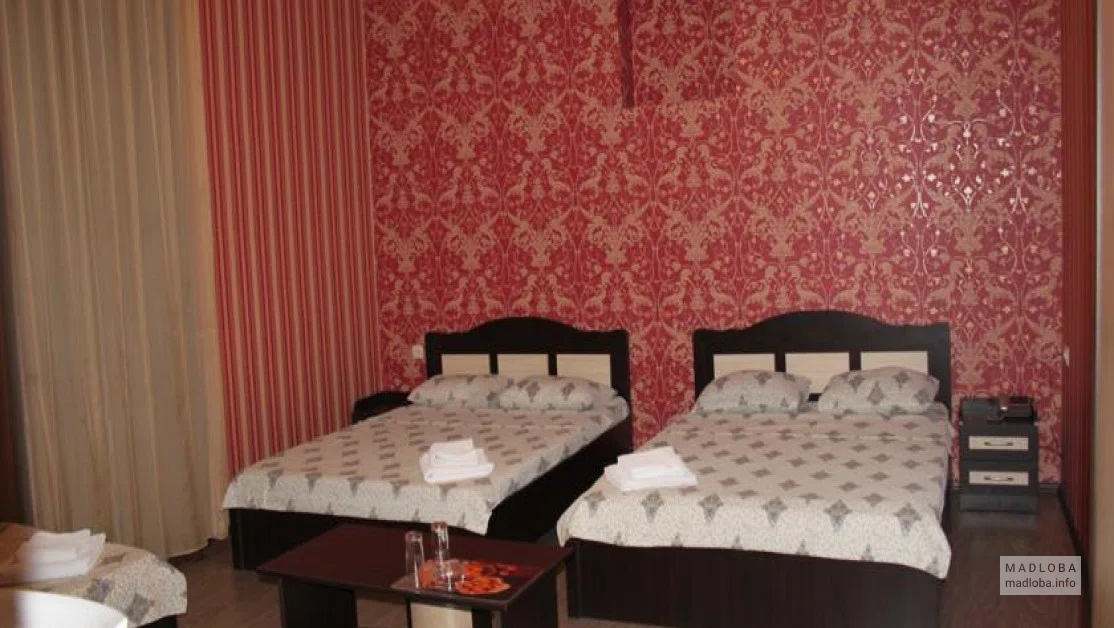 Кровати в отеле Наш дом в Грузии