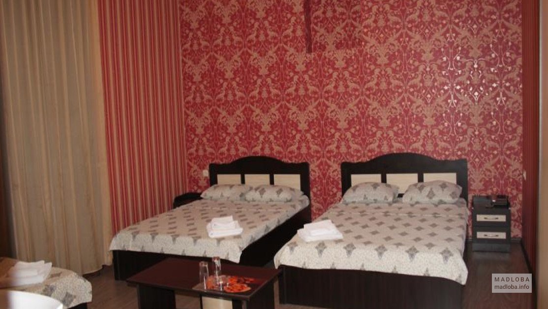 Кровати в отеле Наш дом в Грузии