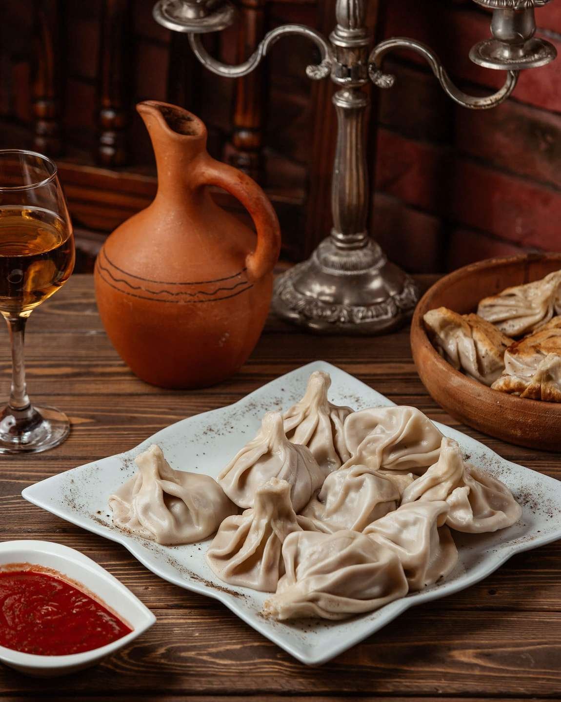 plate-georgian-khinkali-served-with-tomato-past