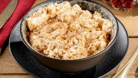 The national Adjarian dish Sinori. Georgian recipe of lavash and cottage cheese