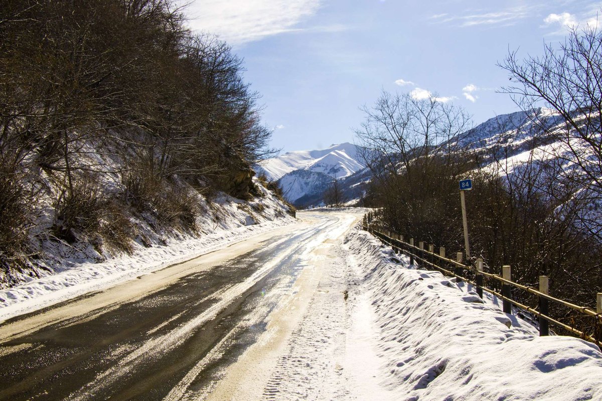 snowy-mountains-and-road-in-gudauri.original