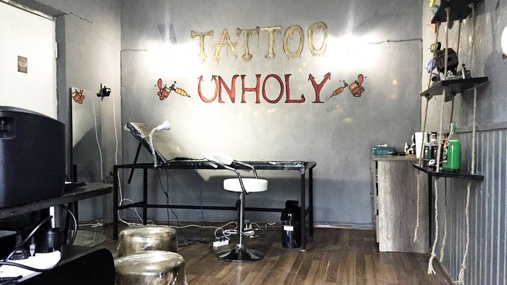 unholy tattoo