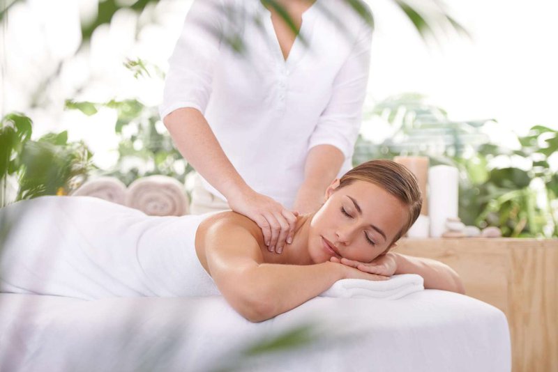 A relaxed woman on a massage session
